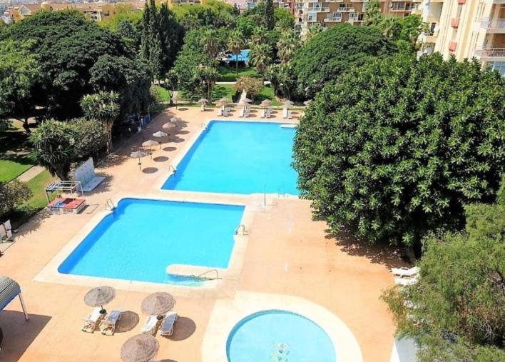 Seaside Vista Apartment: Pool Views Near Beach Benalmadena